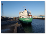 A typical morning in Belfast with not a cloud in the sky, the ‘Arklow Resolve’ loads for Ipswich